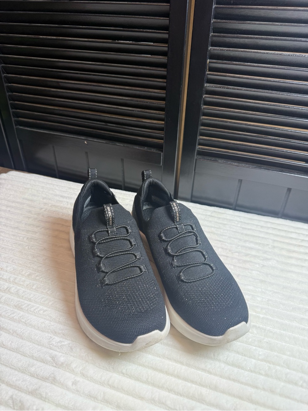 Skechers Black Slip-On Knit Women’s Sneakers with White Sole